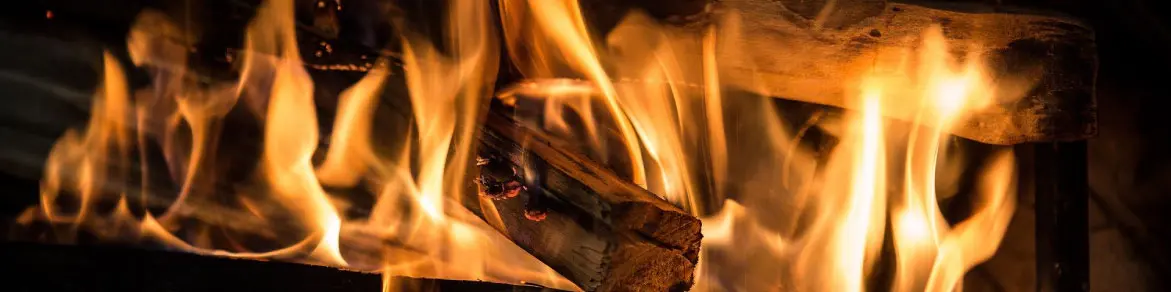 fire in a wood stove {{brizy_dc_image_alt imageSrc=