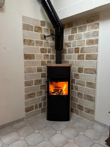 Installation of a wood-burning stove by Cheminées Renou in Villemandeur