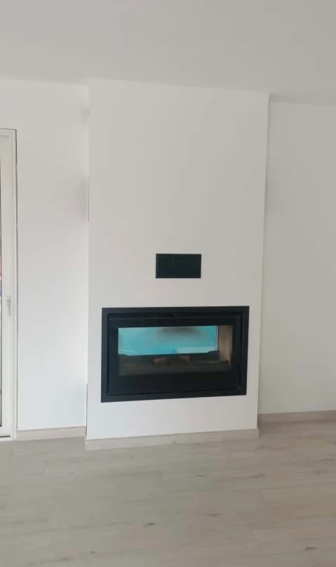 Installation of a wood-burning insert by Chenais Cheminées in Champagné